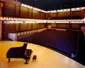 A Classic Image of A Piano Concert Organized in a Grand Music Hall