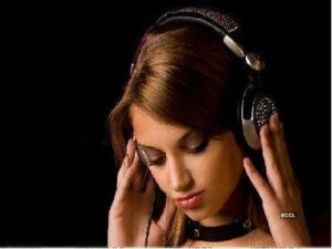 Image Of A Young Girl Listens Music For Her Stress Relief